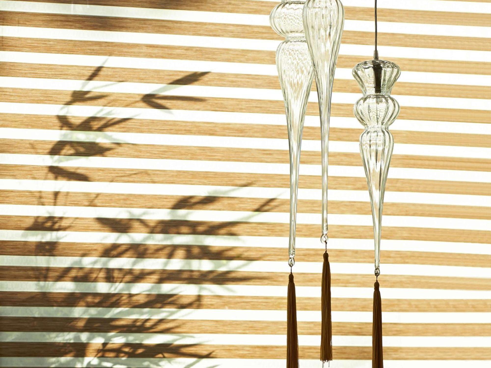 Fairmont Makati Hotell Makati City Eksteriør bilde Hanging bamboo wind chime